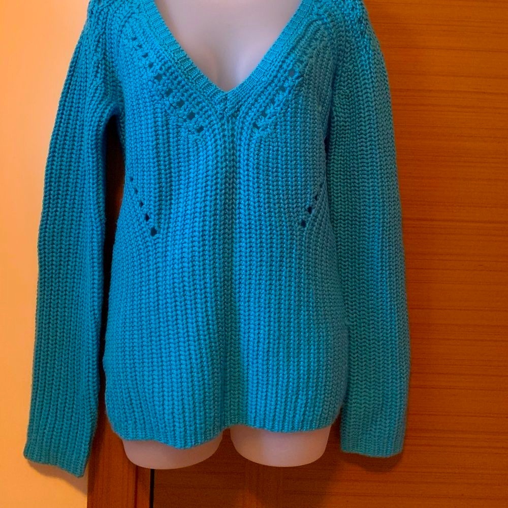 Brand new Calypso sweater